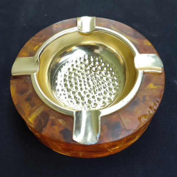 Vintage Solaris amber ashtray made in West Germany, mid-century modern collectible.