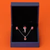 Silver jewellery set featuring polished Marjan red coral stones