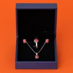 Silver jewellery set featuring polished Marjan red coral stones