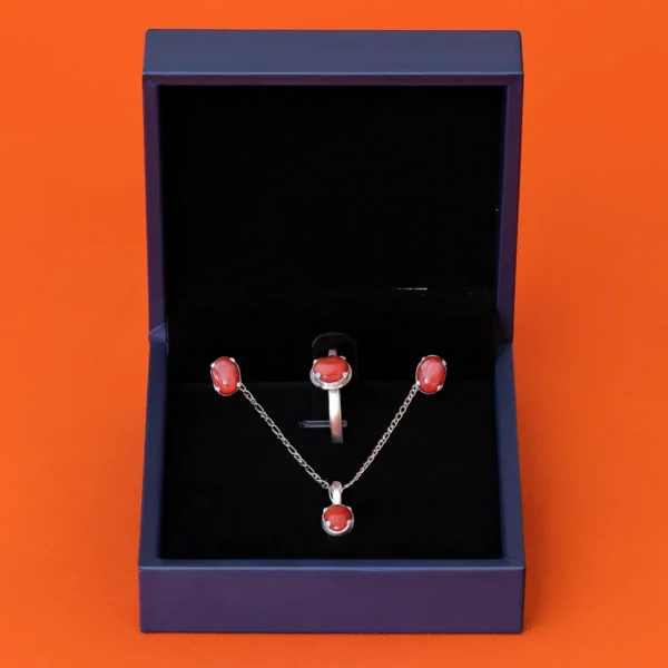 Silver jewellery set featuring polished Marjan red coral stones